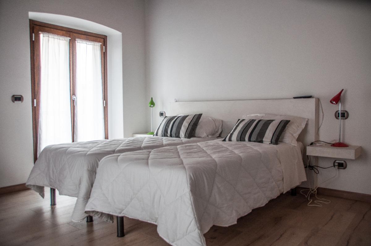 Camera matrimoniale con parquet originale, B&B Santa Lucia Bergamo